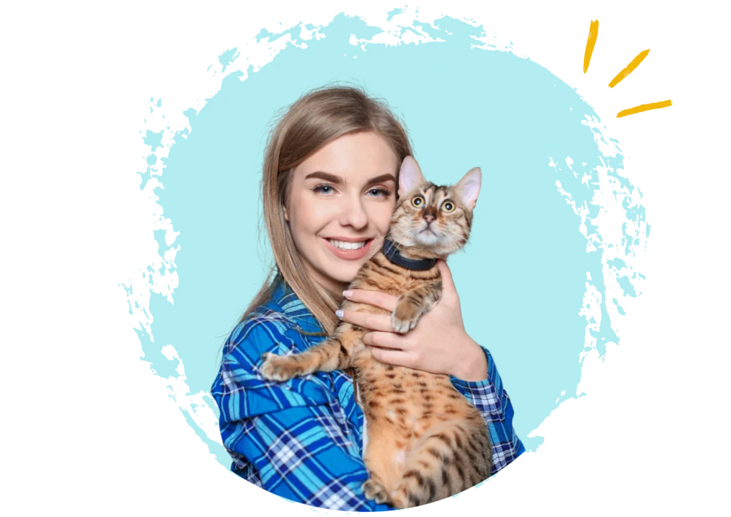 Perra con diadema de corazones rojos mirando al frente junto a un teléfono móvil que muestra a otro perro blanco con gafas.